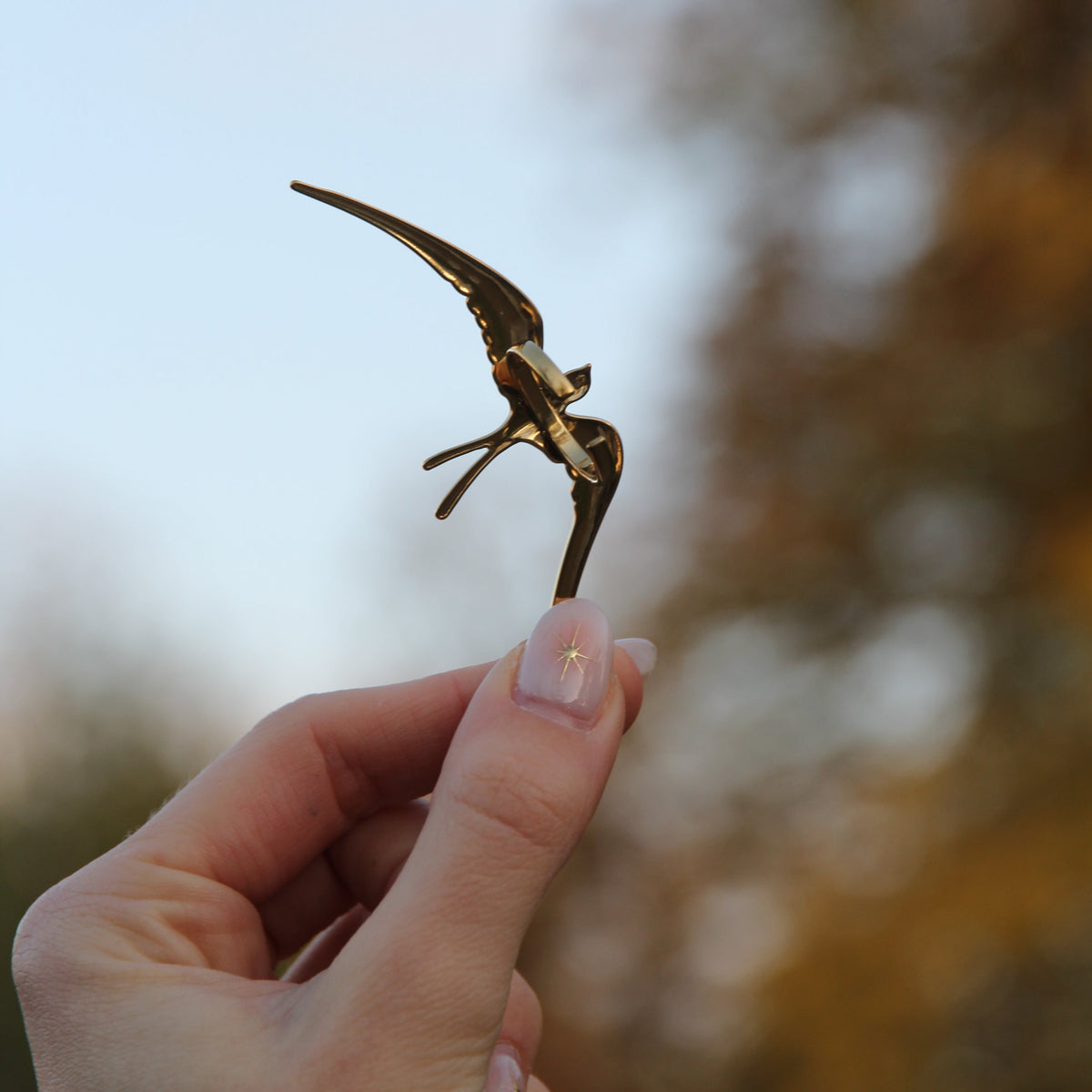 Golden Stainless Steel Open Ring 'Flight of Grace'